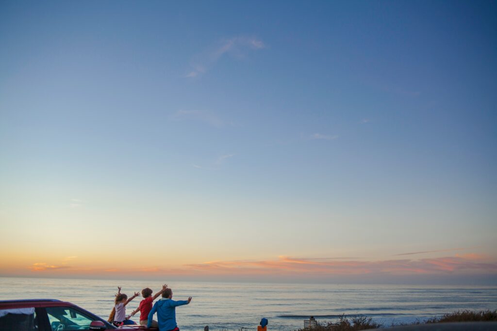 happy family looking at the sea